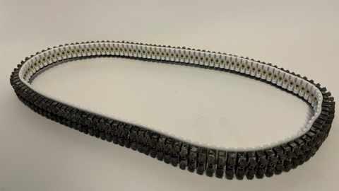 Courroie réparée avec des tasseaux brosses